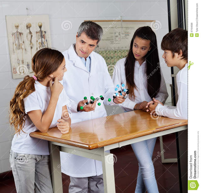 mature porn teacher mature male teacher using student students computer lab desk classroom explaining science molecular structures