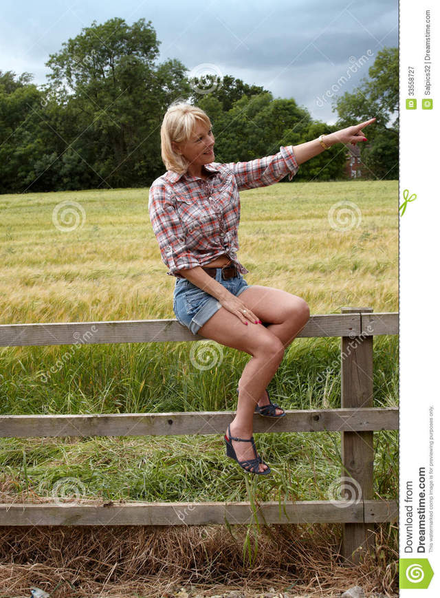 lady mature lady mature free sitting left stock photography royalty pointing fence