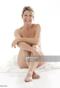 mature woman nude pics photos middle age woman sitting nude picture mature posing stock photo getty