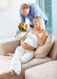 wife mature mature man giving flowers his pregnant wife royalty free stock